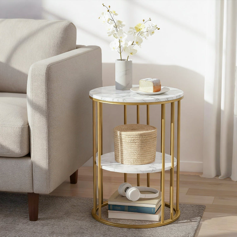 The Aurelia 54cm tall side table with white marble finish and sculptural gold metal frame in a luxury Melbourne interior.