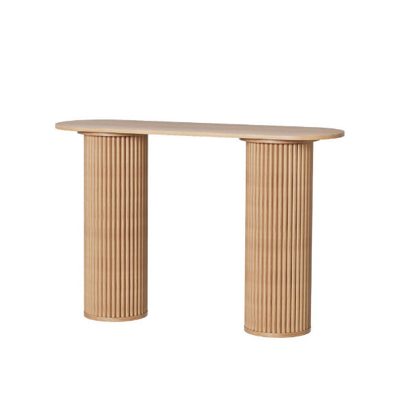 The Blake 115cm fluted console table in natural ash finish with twin ribbed pedestal legs styled in a white font.