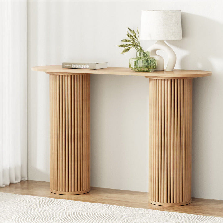 The Blake 115cm fluted console table in natural ash finish with twin ribbed pedestal legs styled in a Japandi entryway.