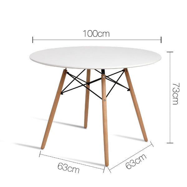The Astra 100cm round table comfortably seating 4 people, highlighting its space-saving mid-century silhouette.