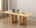 The Kensington 200cm grand dining table in natural oak finish, comfortably seating 8 persons in a spacious dining room.