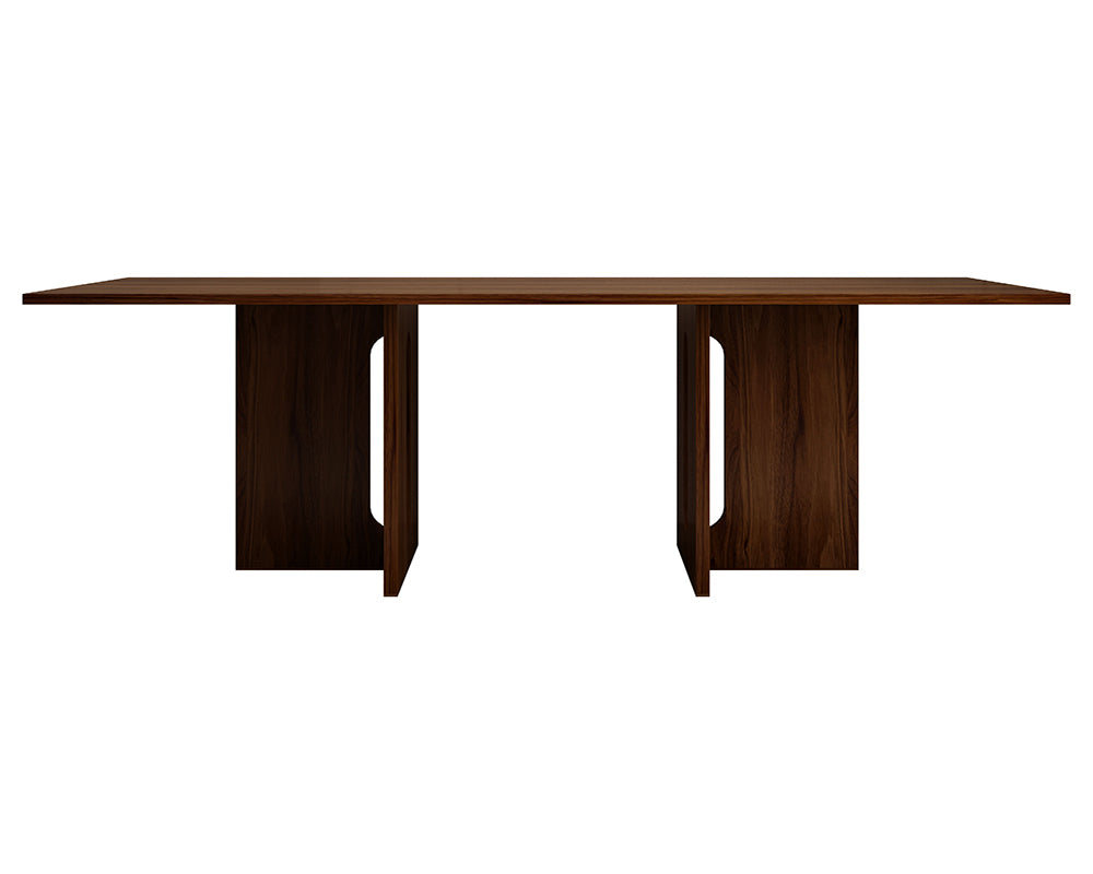 Substantial dark walnut panel legs of the Kensington dining table, highlighting its sturdy and architectural silhouette.