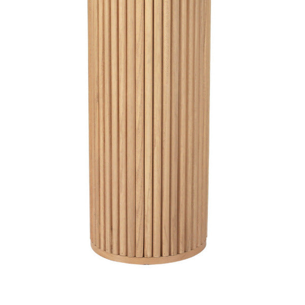 Close-up of the architectural ribbed texture on the solid Paulownia wood pillar legs of the Blake console table.