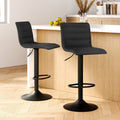 Set of 2 The Lennox black linen swivel bar stools with matte black base styled in a modern Australian kitchen island.