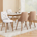Set of 4 Oslo Scandi dining chairs with white diamond-quilted leatherette seats and natural wood grain backs.
