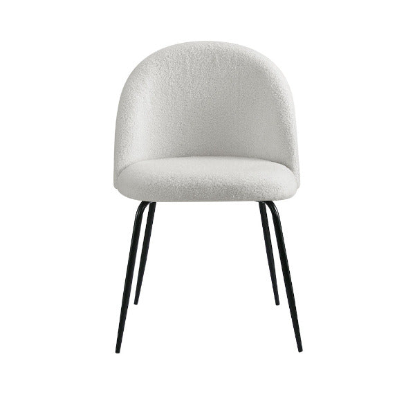 The ergonomic winged backrest of the Tofa chair, designed to hug the body for superior comfort and lumbar support.